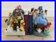 Disneys_Wonderful_World_of_Disney_Set_of_2_Book_End_Snow_Globes_see_description_01_hljg