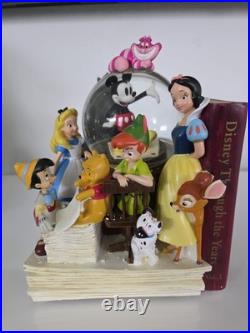 NEW! Disney store many Caracter Snovglobe and Bookend! With music and blower