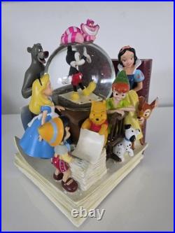 NEW! Disney store many Caracter Snovglobe and Bookend! With music and blower NEW! Disney store many Caracter Snovglobe and Bookend! With music and blower