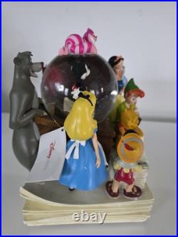 NEW! Disney store many Caracter Snovglobe and Bookend! With music and blower