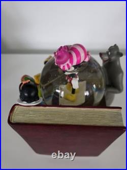NEW! Disney store many Caracter Snovglobe and Bookend! With music and blower