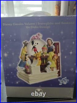 NEW! Disney store many Caracter Snovglobe and Bookend! With music and blower