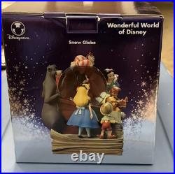 Official Disney Classics Vol 1 & 2 Through the Years Musical Snow Globe Bookend Official Disney Classics Vol 1 & 2 Through the Years Musical Snow Globe Bookend