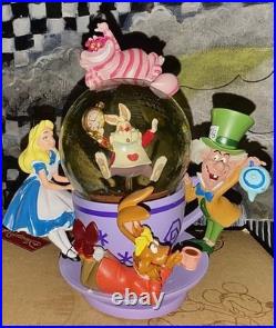 Perfect Condition Disney Parks Alice in Wonderland Tea Cup Spinning Snow Globe
