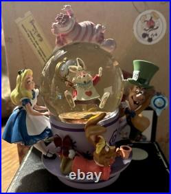 Perfect Condition Disney Parks Alice in Wonderland Tea Cup Spinning Snow Globe