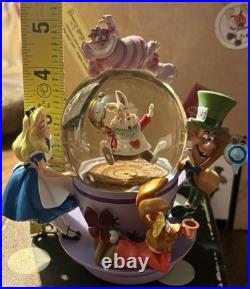 Perfect Condition Disney Parks Alice in Wonderland Tea Cup Spinning Snow Globe