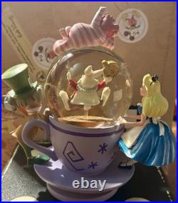 Perfect Condition Disney Parks Alice in Wonderland Tea Cup Spinning Snow Globe