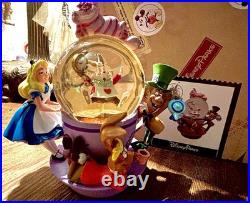 Perfect Condition Disney Parks Alice in Wonderland Tea Cup Spinning Snow Globe
