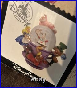 Perfect Condition Disney Parks Alice in Wonderland Tea Cup Spinning Snow Globe