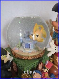 Pinocchio, Geppetto, & Cleo Glitter And Music Globe