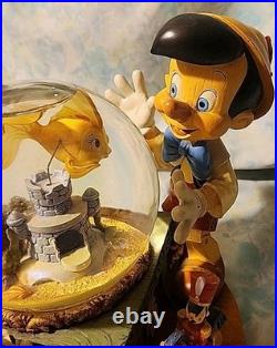 RARE Disney Pinocchio Toyland Fishbowl Cleo Figaro Musical Snow Globe Jln