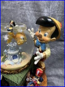 RARE Disney Pinocchio Toyland Fishbowl Musical Snow Globe Cleo Figoro