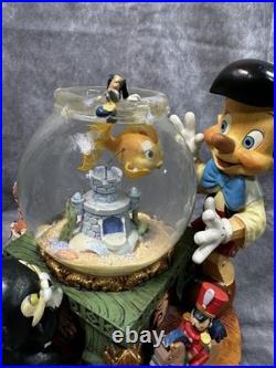 RARE Disney Pinocchio Toyland Fishbowl Musical Snow Globe Cleo Figoro