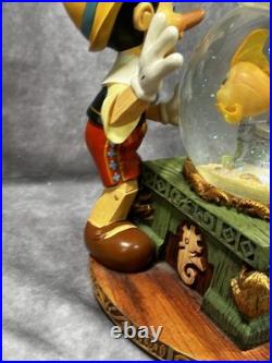 RARE Disney Pinocchio Toyland Fishbowl Musical Snow Globe Cleo Figoro