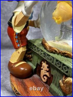 RARE Disney Pinocchio Toyland Fishbowl Musical Snow Globe Cleo Figoro