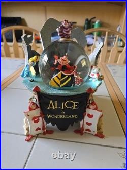 RARE Disney Store Alice in Wonderland Snow Globe nothing broken, music works