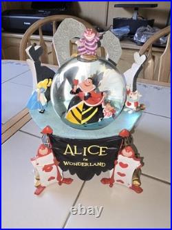 RARE Disney Store Alice in Wonderland Snow Globe nothing broken, music works
