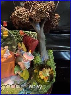 Rare Disney Alice In Wonderland Tea Party Musical Snow Globe with Brown Trees