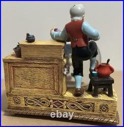 Rare Disney Geppetto's Workshop Pinocchio Snow Globe. Pre owned. (No Box)