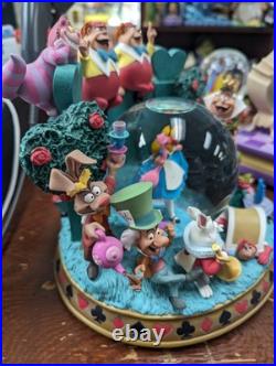 VERY RARE Alice in Wonderland Musical Snow Globe Disney Store VERY RARE Alice in Wonderland Musical Snow Globe Disney Store