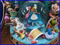 VERY RARE Alice in Wonderland Musical Snow Globe Disney Store VERY RARE Alice in Wonderland Musical Snow Globe Disney Store