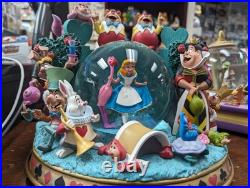 VERY RARE Alice in Wonderland Musical Snow Globe Disney Store VERY RARE Alice in Wonderland Musical Snow Globe Disney Store