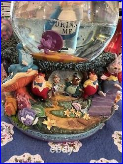 VTG Disney Alice in Wonderland Drink Me All in the Golden Afternoon Snow Globe