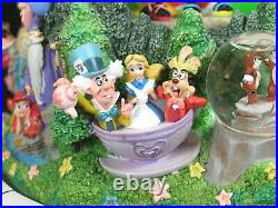 Vintage Disney Four Parks One World Multi Character Monorail Musical Snow Globe