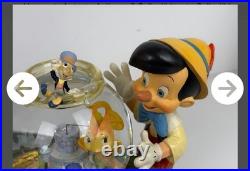 Vintage Disney Pinocchio Toyland Fishbowl Cleo Figoro Musical Snow Globe Jiminy