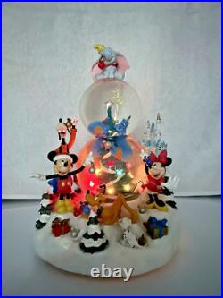 Walt Disney Christmas Snow globe plays G3D