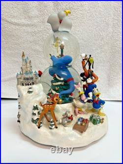 Walt Disney Christmas Snow globe plays G3D