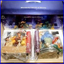 Walt Disney Through The Years Vol. 1 & 2 Music Box Snowglobe Bookends Set